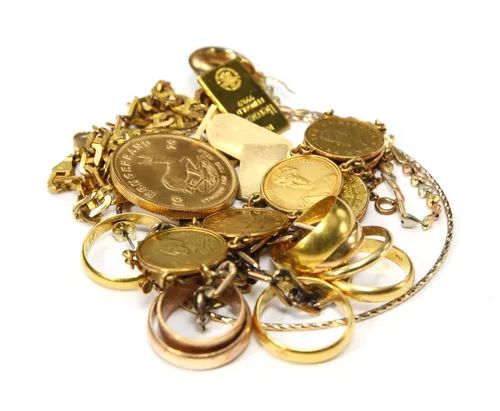 Broken chains and scrap gold ready for weighing